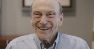 Old Man Smiling And Laughing Into Camera Stock Footage