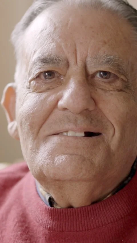 Old man smiling at camera sitting in a nursing home Stock Footage 269760439
