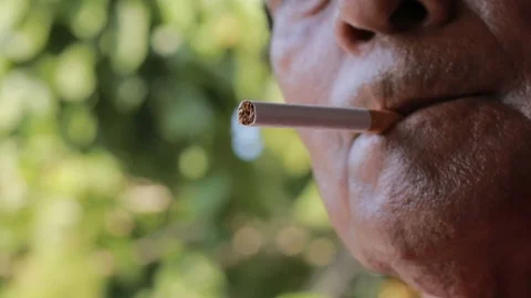 Old Man Smokes Cigarette 2 Stock Footage 123085701
