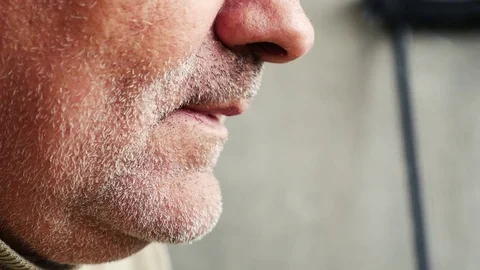 The old man smokes a cigarette Stock Footage 80217029