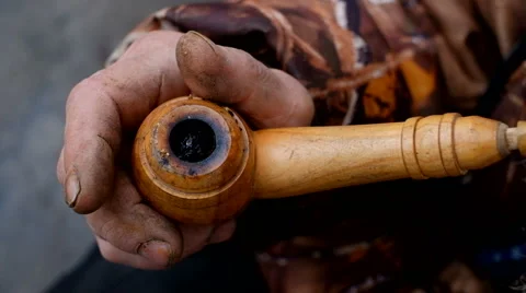 The old man smoking a pipe Stock Footage 61610088