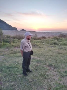 Old man spending time on the beach Stock Photos