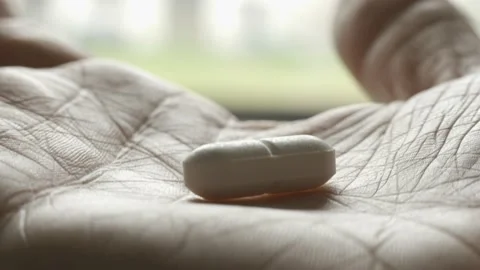 Old Man Taking His Pill, Wrinkled Hand Macro Stock Footage 162245039