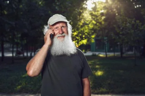 Old man talking on the phone Stock Photos