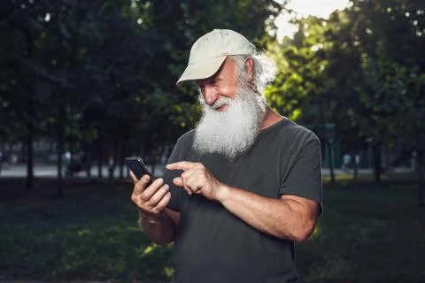 Old man talking on the phone Stock Photos