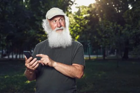 Old man talking on the phone Stock Photos