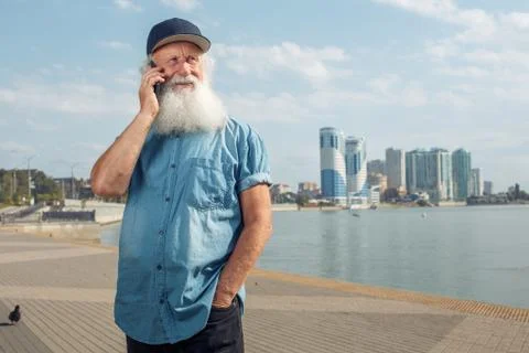 Old man talking on the phone Stock Photos