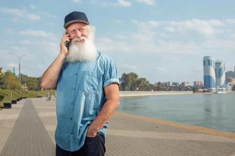 Old man talking on the phone Stock Photos