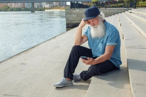 Old man talking on the phone Stock Photos