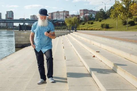 Old man talking on the phone Stock Photos