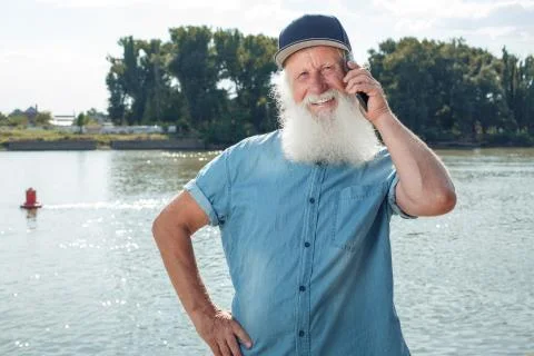 Old man talking on the phone Stock Photos