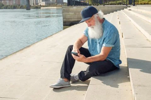 Old man talking on the phone Stock Photos