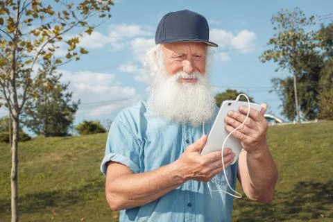 Old man talking on the phone Stock Photos