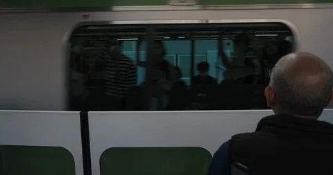 Old man in the Tokyo subway Stockbeeldmateriaal 120879546