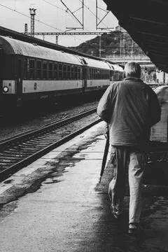 An Old Man on a Train Station Stock Photos