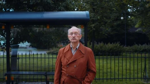 Old man at tram stop 스톡 동영상 81704264