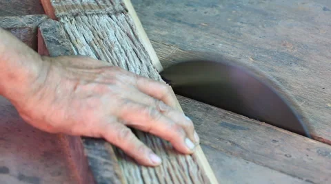 Old man use saw machine cut old wood (sound) Stock Footage 46204515