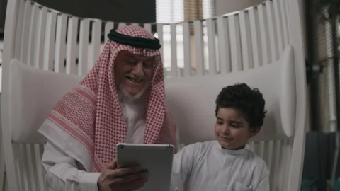 Old man using a digital tablet with grandson Stock Footage 105803651