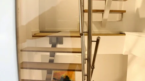 Old man using elevator in small old hotel Stock Footage