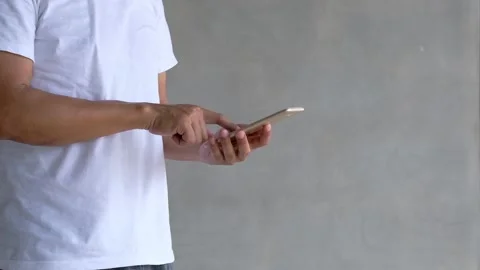 The old man using a smartphone fluently Stock Footage 132973289