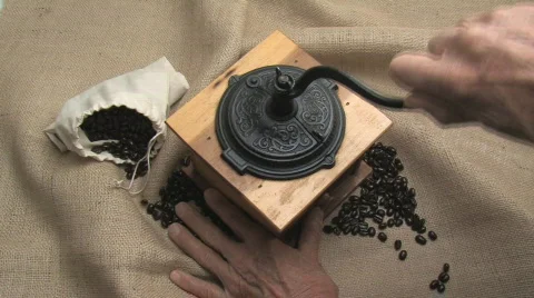Old Man Using Vintage Coffee Grinder Stock Footage 659928