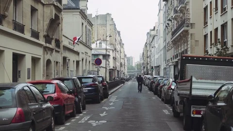 Old man walking alone on empty street during coronavirus lockdown in Paris 4K Video stock 128385436