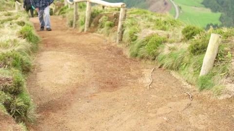 An Old Man Walking from the Sete Cidades Stock Footage 61053390