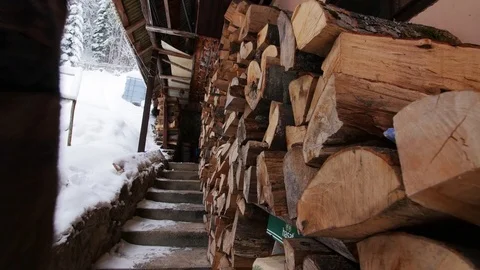 Old Man Walking Up The Stairs Of A Cabin In Winter Video stock 85077579