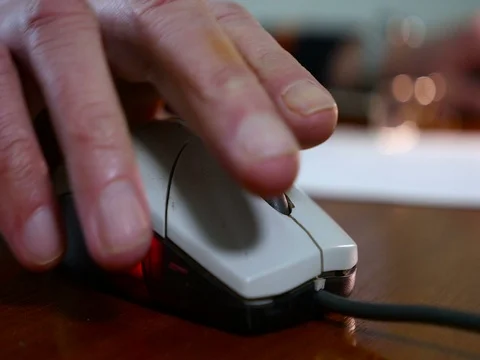 Old man working with mouse Stock Footage 71530084