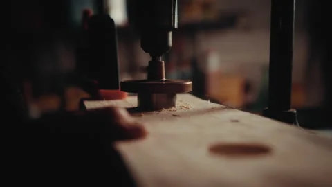 Old man working with a saw cutting a piece of wood Video stock 139756035