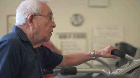Old man works out side shot Stock Footage 10716863