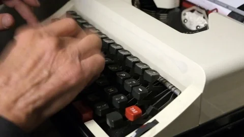 Old man write on Oldfashioned typewriter Stock Footage 81716383