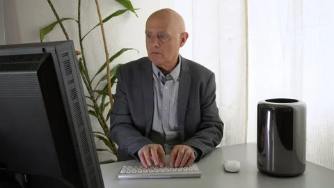 Old Manager in Suit Typing on Computer in Office - Lawyer, Accountant or Banker Stock Footage 113080977