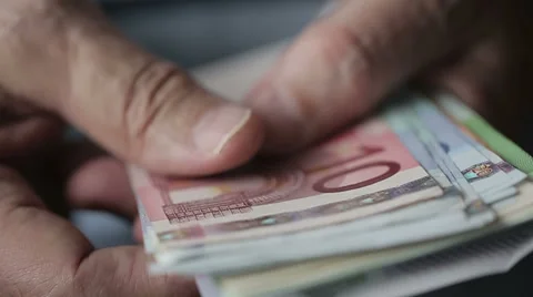 Old man's hands counting euro banknotes. Slow motion. Close up Stock Footage 47139859