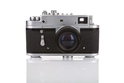 Old manual camera on white background with reflection Stock Photos