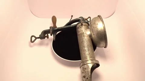 Old manual tomato strainer in use – 19‑second rotation video Stock Footage 337023435