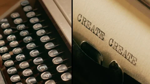 Old manual typewriter types "create" split screen and individual shots Stock Footage 289337916