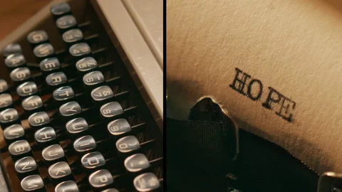 Old manual typewriter types "hope" split screen and individual shots Stock Footage 289319495