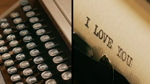 Old manual typewriter types "I love you" split screen and individual shots Stock Footage 289327210