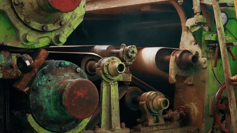 Old Manufactoring equipment Produce Paper Machine Shafts At Paper Mill Stock Footage