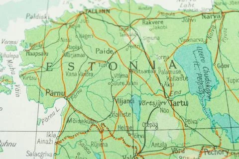 Old map of eastern Europe highlights Estonia with forests, roads, rivers, and Stock Photos