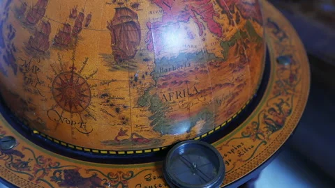 Old mariner’s Compass On Globe Video stock 164653251
