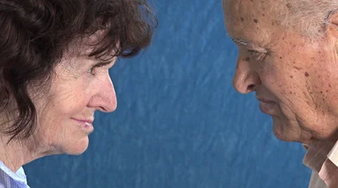Old married couple looking each other: pensive old people portrait Video stock 64271678