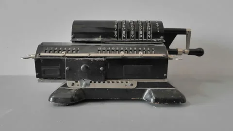 Old Mechanical Calculator Adding Machine Stock Footage 153835314