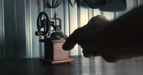 Old mechanical coffee grinder stands in the kitchen Video stock 168717318