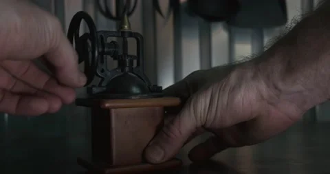 Old mechanical coffee grinder stands in the kitchen Stock Footage 168717612