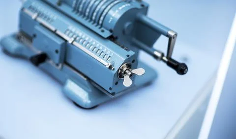 Old mechanical manual counting machine for mathematical calculations Stock Photos