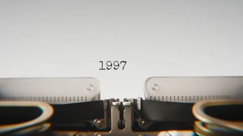 Old mechanical typewriter typing Year 1997 in a close-up view, with metal Video stock 321452439
