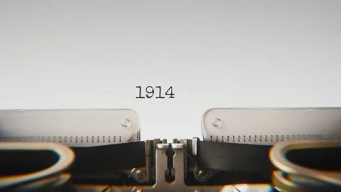 Old mechanical typewriter typing Year 1914 in a close-up view, with metal Stock Footage 321452466