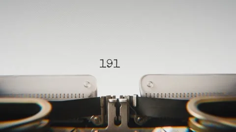 Old mechanical typewriter typing Year 1915 in a close-up view, with metal Stock Footage 321452470